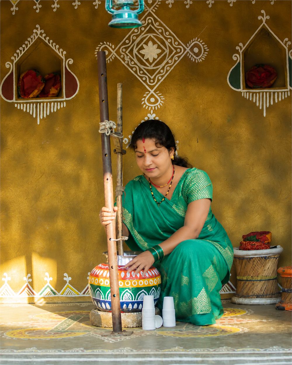 Curd churned by hand with a wooden bilona